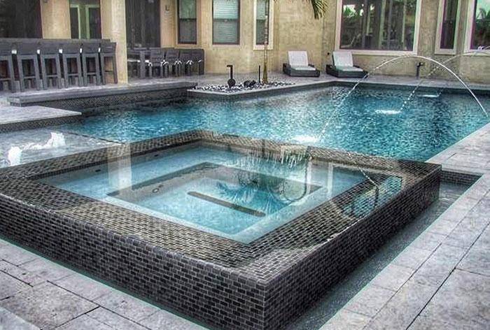 swimming pool with Jacuzzi and water fountain