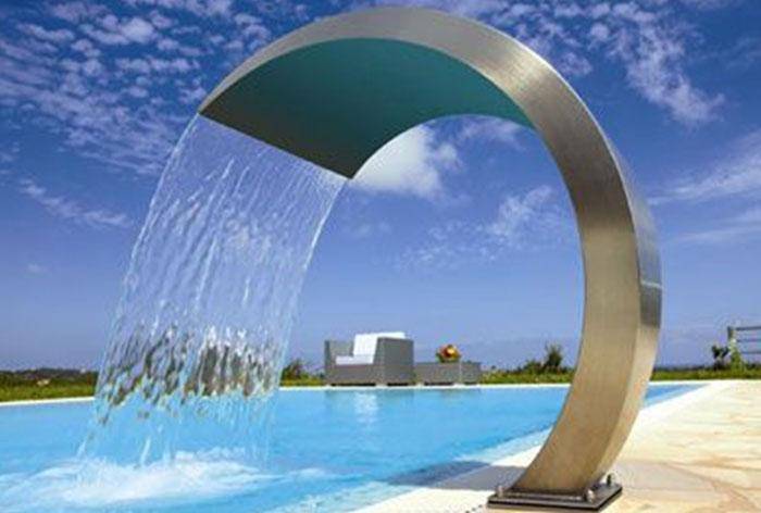 Stainless steel water fountain in swimming pool