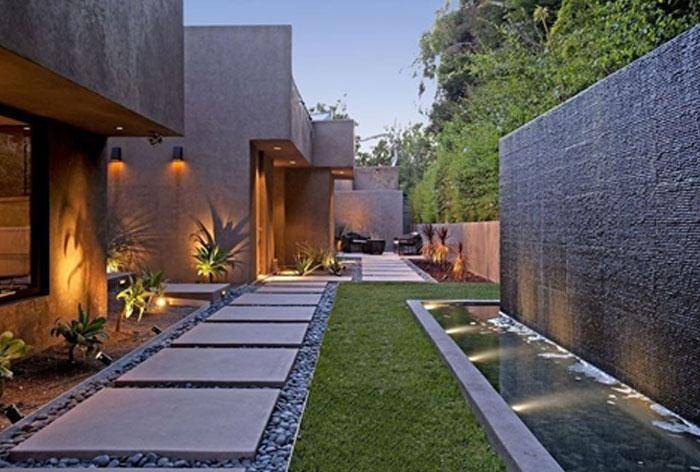 Home 2 Landscape with water features and pebble pathways