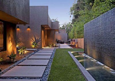 2. Artificial Grass Tiles with Water Feature