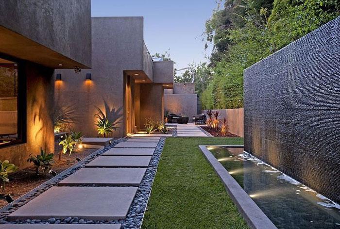 2. Artificial Grass Tiles with Water Feature